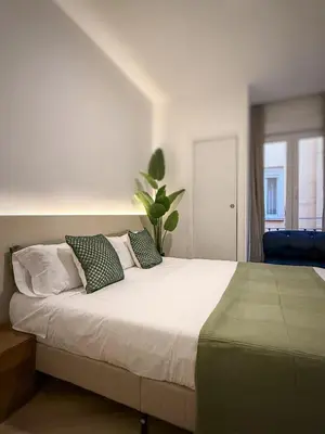 Cama o camas de una habitación en Calle de la Cruz habitaciones