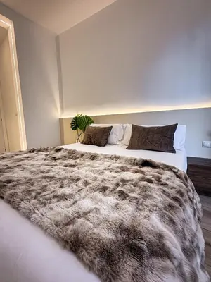 Cama o camas de una habitación en Calle de la Cruz habitaciones