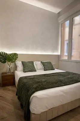 Cama o camas de una habitación en Calle de la Cruz habitaciones