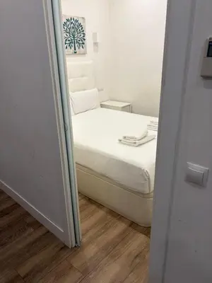 Cama o camas de una habitación en Exyca Malasaña