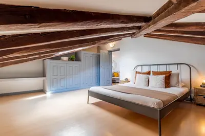 Cama o camas de una habitación en Heima buhardilla de ensueño