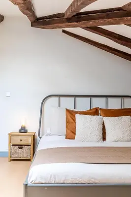 Cama o camas de una habitación en Heima buhardilla de ensueño