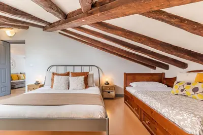 Cama o camas de una habitación en Heima buhardilla de ensueño