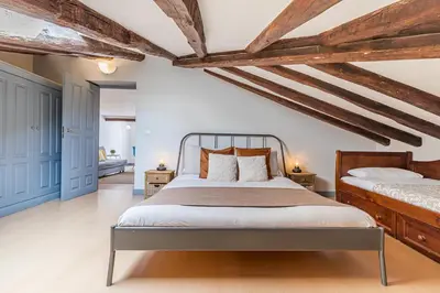 Cama o camas de una habitación en Heima buhardilla de ensueño