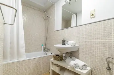 Un baño de Heima Madrid letras 3A