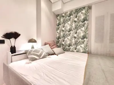 Cama o camas de una habitación en Aura Design Suite