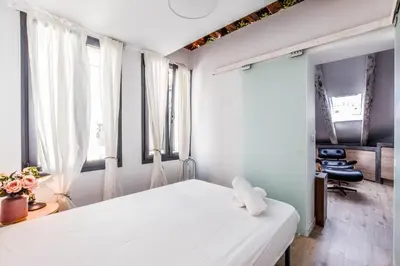 Cama o camas de una habitación en Exclusive Stay Plaza Mayor & La Latina