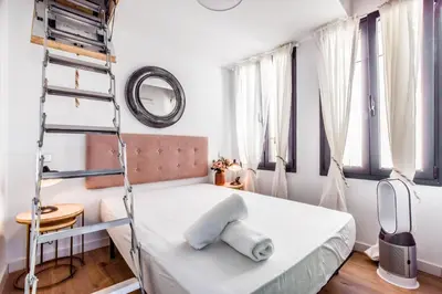 Cama o camas de una habitación en Exclusive Stay Plaza Mayor & La Latina