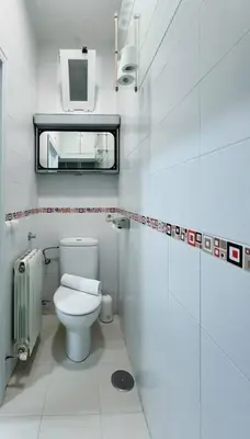 Un baño de Habitación Chueca 2D