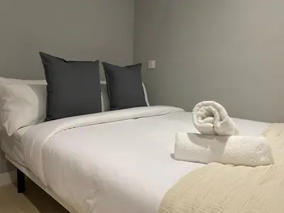 Cama o camas de una habitación en Apartamentos Chueca 6