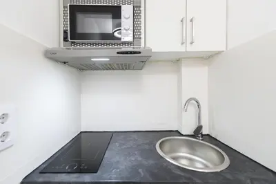 Una cocina o zona de cocina en RJS3 - Acogedor Estudio en Barrio Salamanca - Temporal