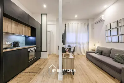 Una cocina o zona de cocina en MyHouseSpain - Acogedor apartamento cerca de Atocha II