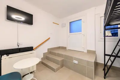 Una televisión o centro de entretenimiento en SMA1401 - Acogedor estudio en Ciudad Lineal - Alquiler temporal