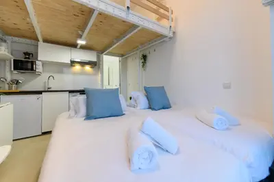 Cama o camas de una habitación en RBL180 - Acogedor dúplex en Salamanca, Madrid - Alquiler temporal