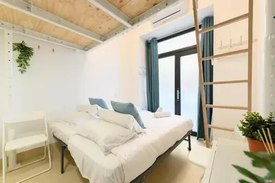 Cama o camas de una habitación en RBL180 - Acogedor dúplex en Salamanca, Madrid - Alquiler temporal