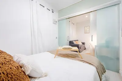 Cama o camas de una habitación en Private Embajadores Apartment