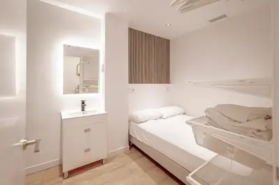 Cama o camas de una habitación en L32-Amazing apartment 5 min from Madrid Atocha Station