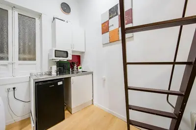 Una cocina o zona de cocina en Private Apartment in La Latina