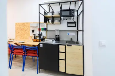 Una cocina o zona de cocina en ROB20E - Acogedor piso en Puente de Vallecas, Madrid - Alquiler temporal