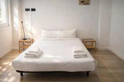 Cama o camas de una habitación en Rooms Centro de Madrid