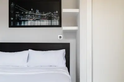 Cama o camas de una habitación en Rooms Centro de Madrid