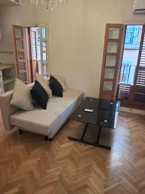 Zona de estar de Piso a 5 min de la Puerta del Sol