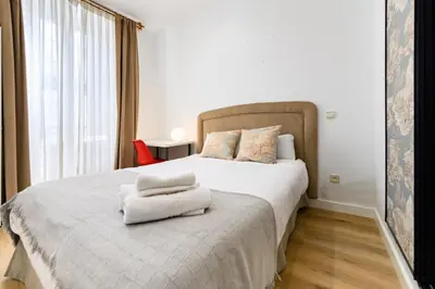 Cama o camas de una habitación en DLM73 - Piso de 2 dormitorios en el Centro de Madrid, Sol - Temporal