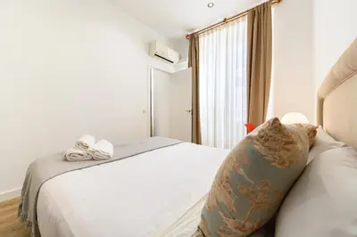 Cama o camas de una habitación en DLM73 - Piso de 2 dormitorios en el Centro de Madrid, Sol - Temporal