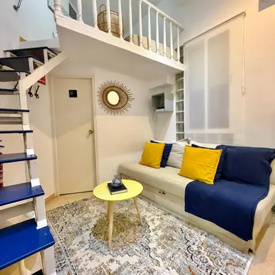 Zona de estar de Cozy apartment in the center