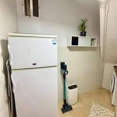 Una cocina o zona de cocina en Cozy apartment in the center