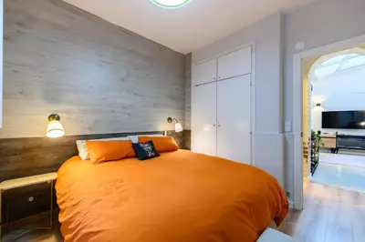 Cama o camas de una habitación en OLM102BA - Amplio y luminoso piso de 2 dormitorios en el centro de Madrid - Alquiler temporal