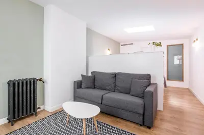 Zona de estar de Home Suite Home Gran Via, en pleno centro
