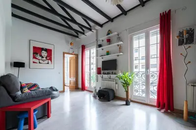 Una televisión o centro de entretenimiento en GuestReady - Bright apartment in Salamanca
