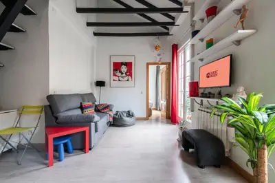 Una televisión o centro de entretenimiento en GuestReady - Bright apartment in Salamanca