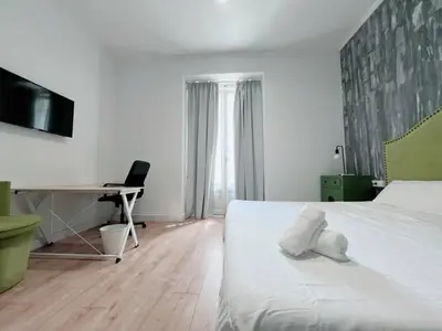 Cama o camas de una habitación en Habitación Plaza Zerolo A