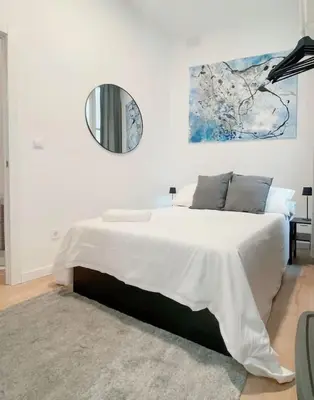 Cama o camas de una habitación en Habitación Pedro Zerolo 7
