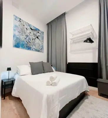 Cama o camas de una habitación en Habitación Pedro Zerolo 7
