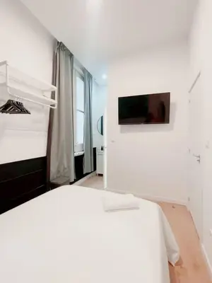 Cama o camas de una habitación en Habitación Pedro Zerolo 7