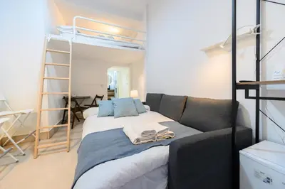 Cama o camas de una habitación en IRI70 - Acogedor Dúplex en el barrio Salamanca - Alquiler temporal