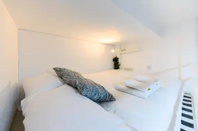 Cama o camas de una habitación en IRI70 - Acogedor Dúplex en el barrio Salamanca - Alquiler temporal