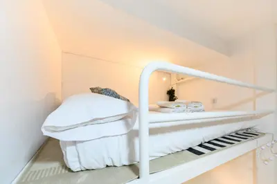 Cama o camas de una habitación en IRI70 - Acogedor Dúplex en el barrio Salamanca - Alquiler temporal