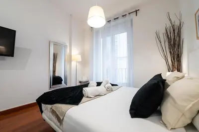 Cama o camas de una habitación en GuestReady – Modern studio in Madrid city centre