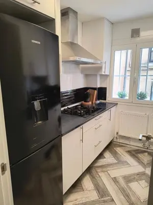 Una cocina o zona de cocina en Para familias o grupo de amigos - BARRIO DE LAS LETRAS - MADRID CENTRO