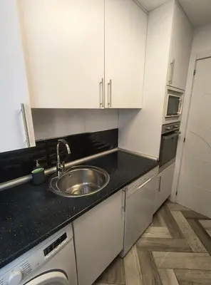Una cocina o zona de cocina en Para familias o grupo de amigos - BARRIO DE LAS LETRAS - MADRID CENTRO