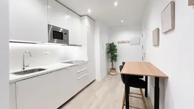 Una cocina o zona de cocina en Alamansa 110, Apartamento A