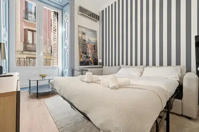 Cama o camas de una habitación en Gran Via Best Apartment