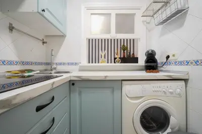 Una cocina o zona de cocina en Gran Via Best Apartment