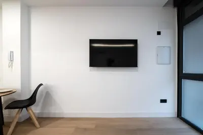 Una televisión o centro de entretenimiento en New Designer Studio Madrid - Next to Casa de Campo