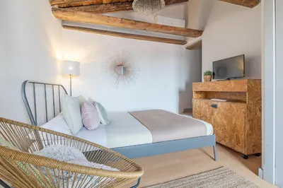 Cama o camas de una habitación en Heima ático en las Letras. Alquiler temporal