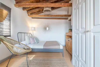 Cama o camas de una habitación en Heima ático en las Letras. Alquiler temporal